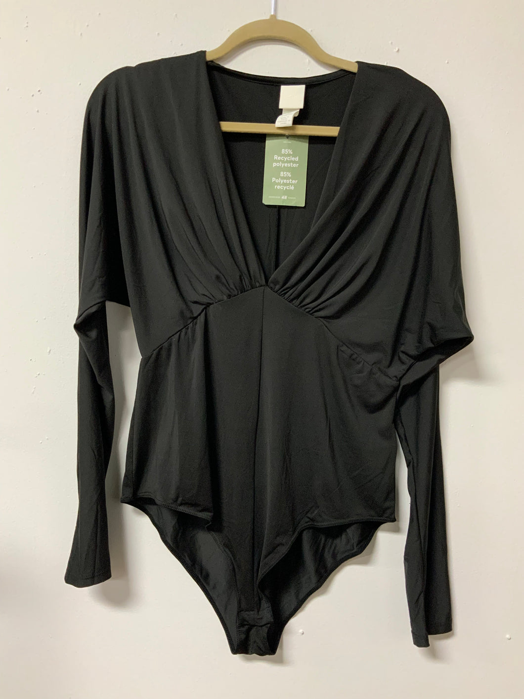 H&M’s (L) black bodysuit NWT